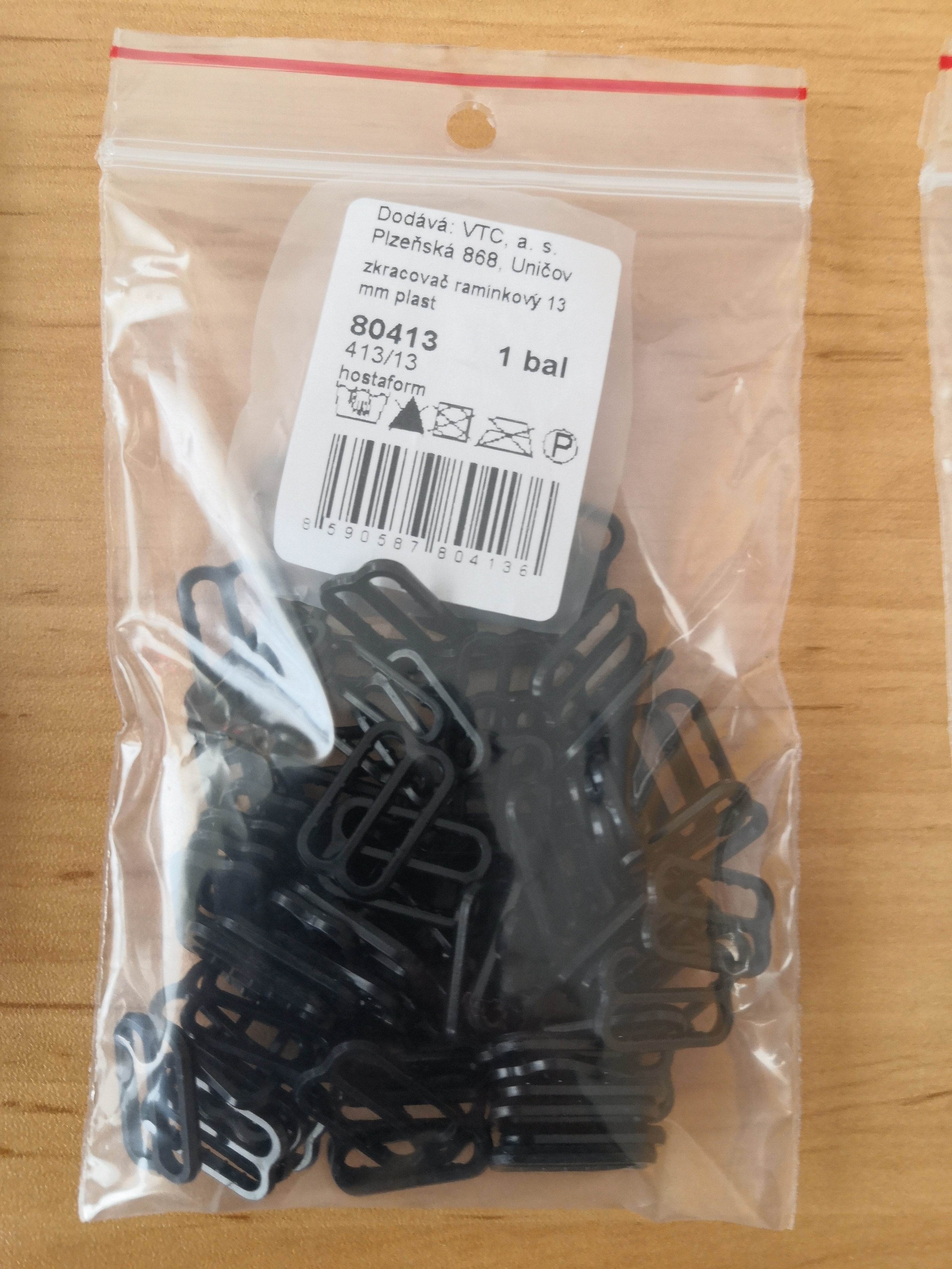 Zkracovač ramínkový 13 mm plast černá