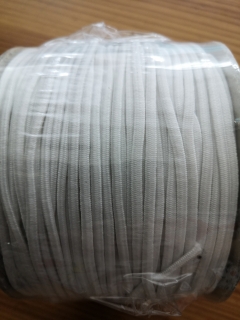 bílá okrouhlá pruženka 2mm - spíše plocha
